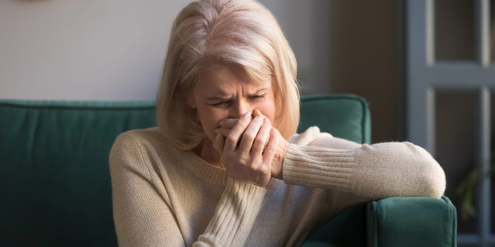 Grieving older woman